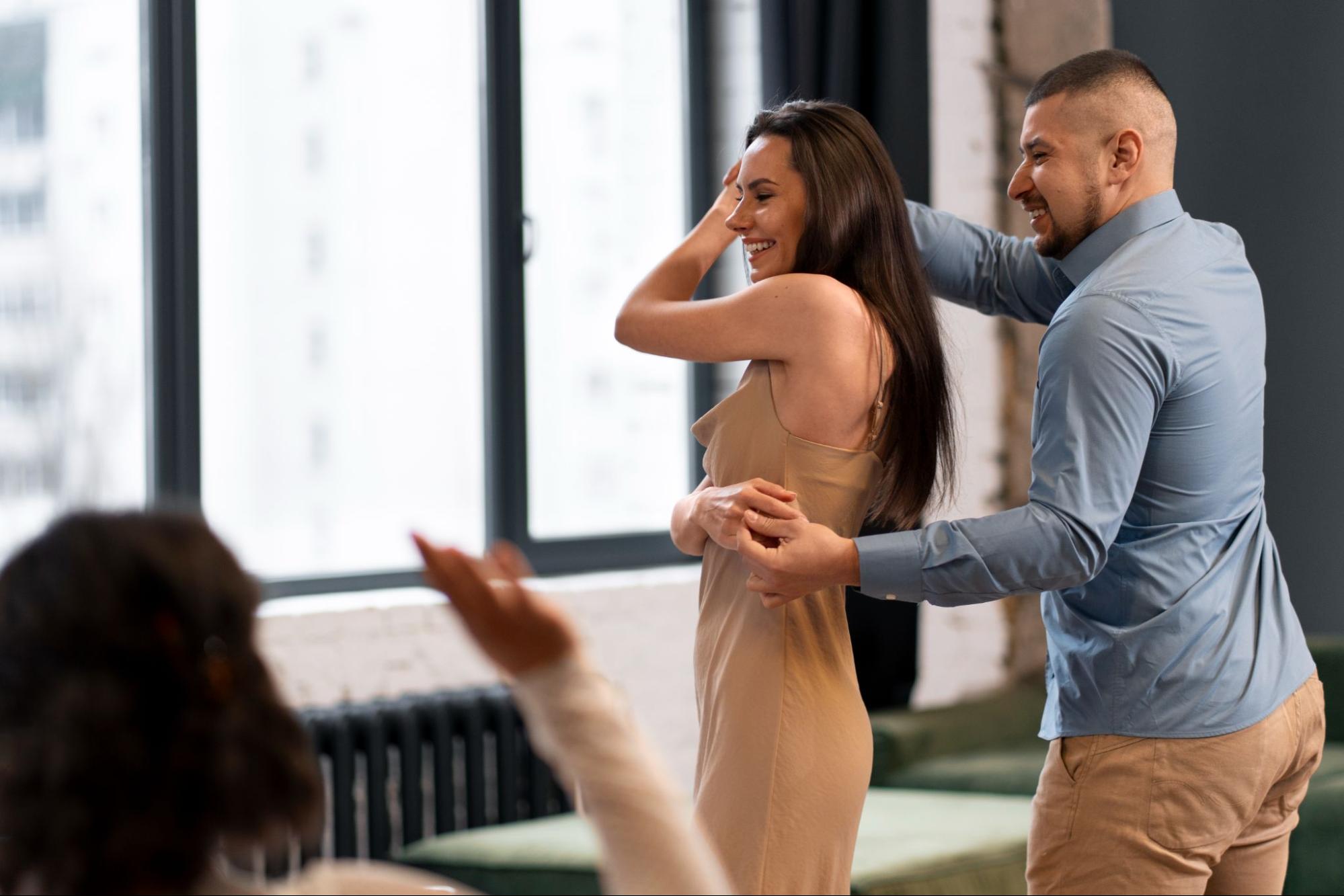 Instructor guiding students through Bachata partner dance techniques