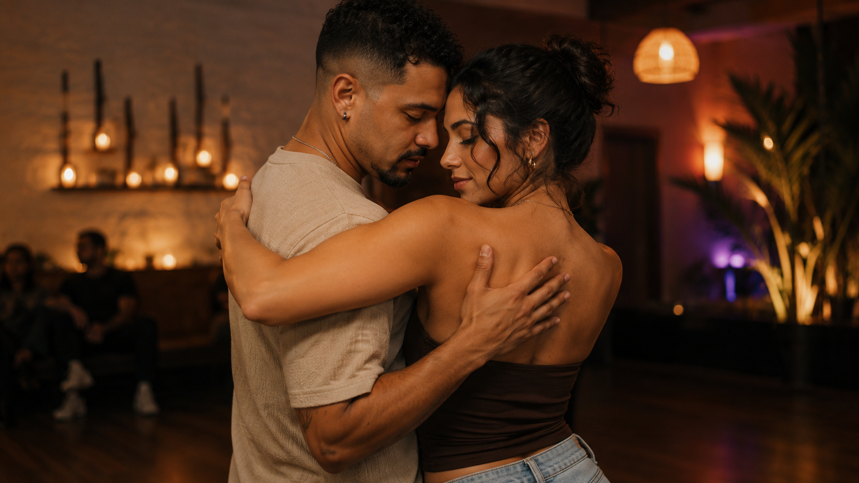 Partners in a Bachata close embrace showing the intimate connection and emotional depth of the dance